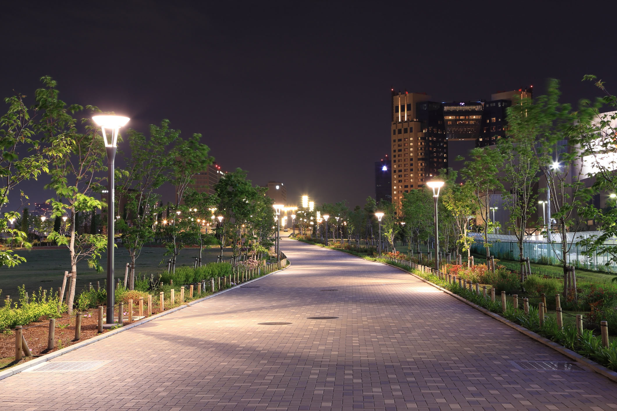 Intelligent Streetlights at night in a paved alley. Delivering proven results